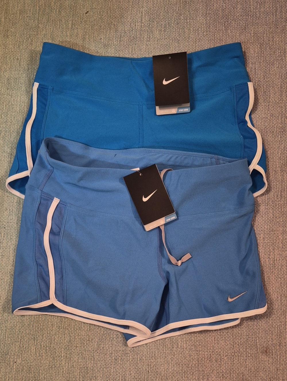 Set Of Two Nike Women’s Blue Athletic Shorts with White Trim